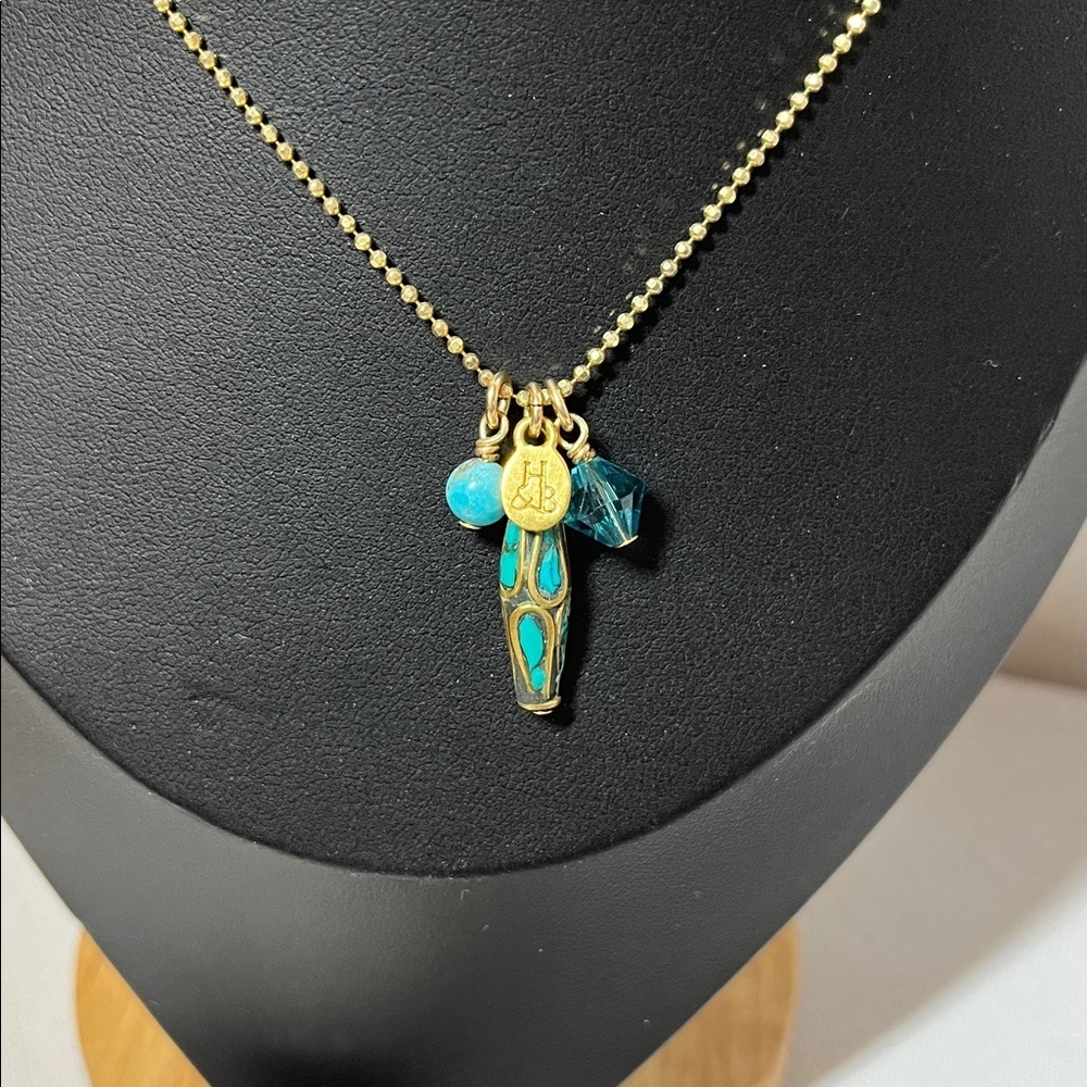 Hillberg & Berk Gold and blue Pendant Necklace. Signature tag. Gold tone chain
